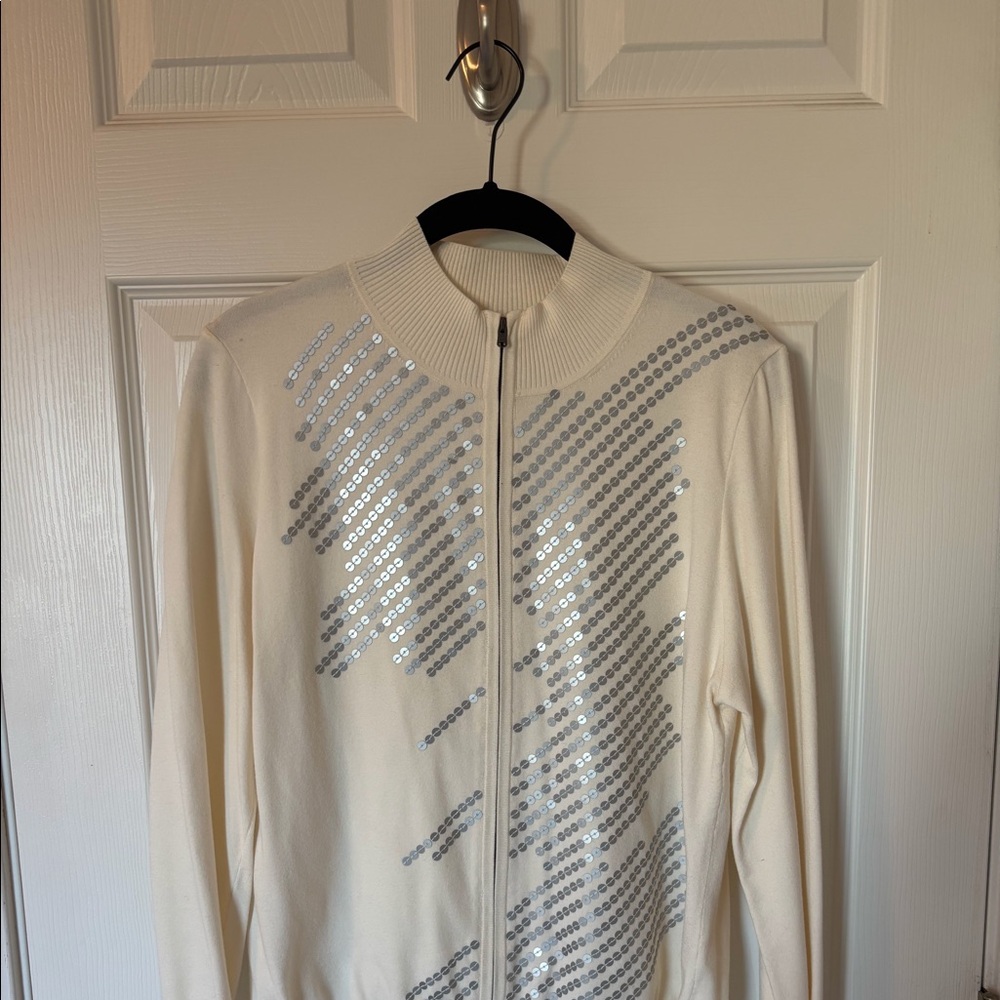 A woman’s white cardigan